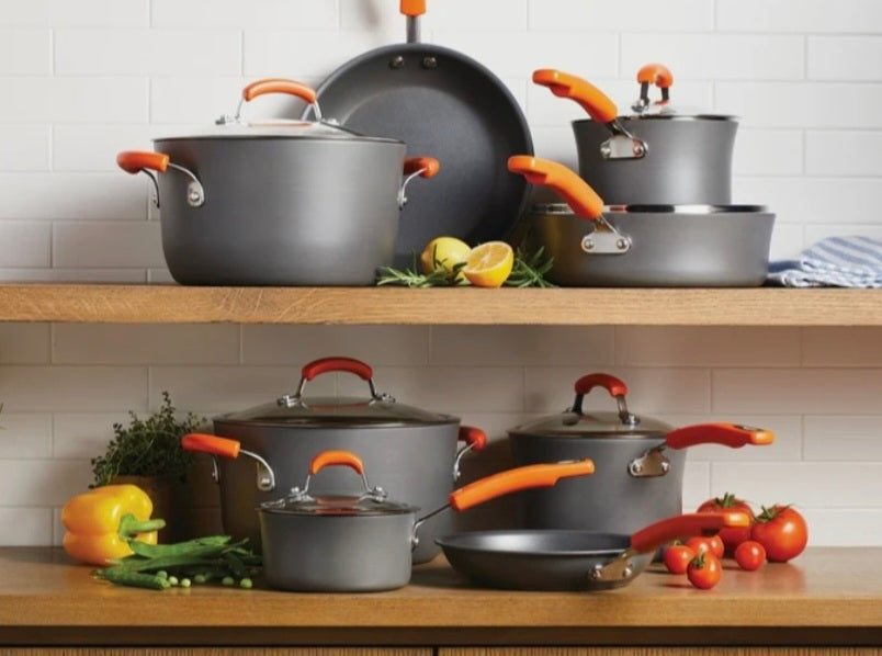 Rachael Ray Hard Anodised Nonstick 8 piece Pots and Pans Set, dishwasher safe with toughened glass lids and orange handles